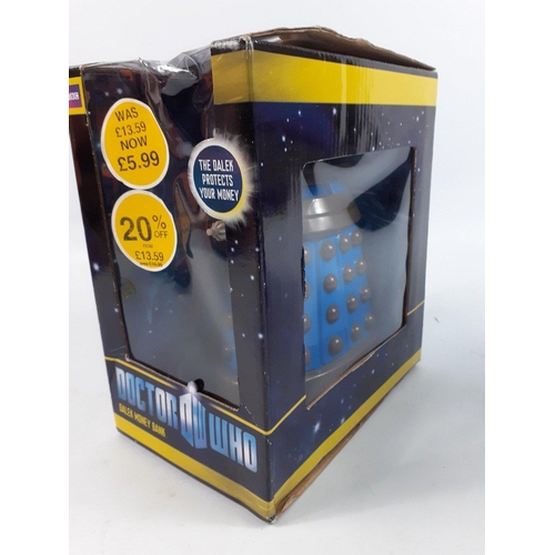 169 - DOCTOR WHO - a boxed blue Dalek money bank (slight damage to box)  and a boxed diecast collectable C... 