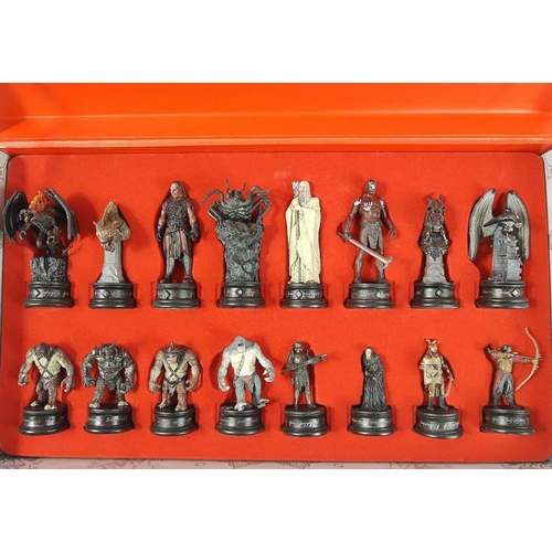 227 - LORD OF THE RINGS two boxed, unused, sets of chess pieces - one white and one black - for The Final ... 