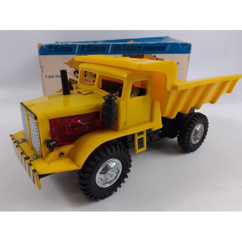 243 - A vintage 1960'S DAISY MATIC No. 62 dump truck in fairly good condition with box (in poor condition)... 