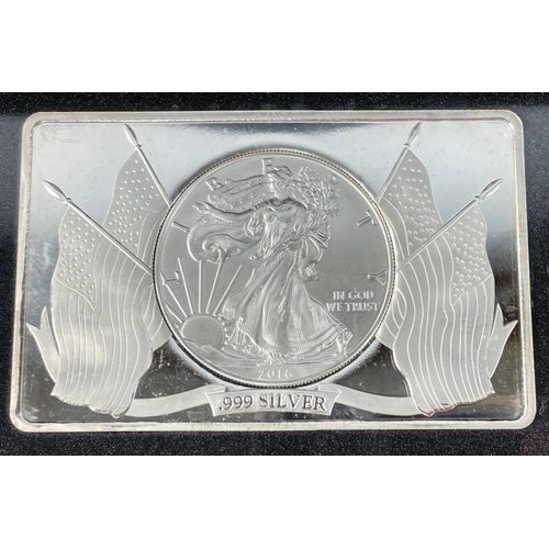 25 - A 2016 5oz silver bullion eagle coin bar and a 2011 coloured silver eagle coin set - both items are ... 