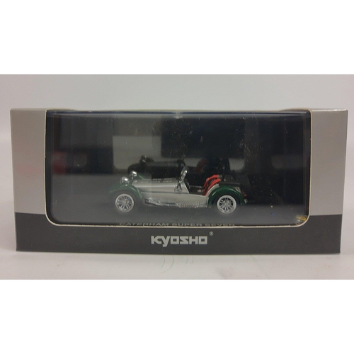 273 - A boxed KYOSHO 1:43 scale diecast Caterham Super Seven in green/silver (03151G)#273