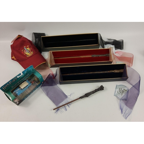 280 - HARRY POTTER - to include three top quality wands in cases lined with velvet and covered in organza ... 