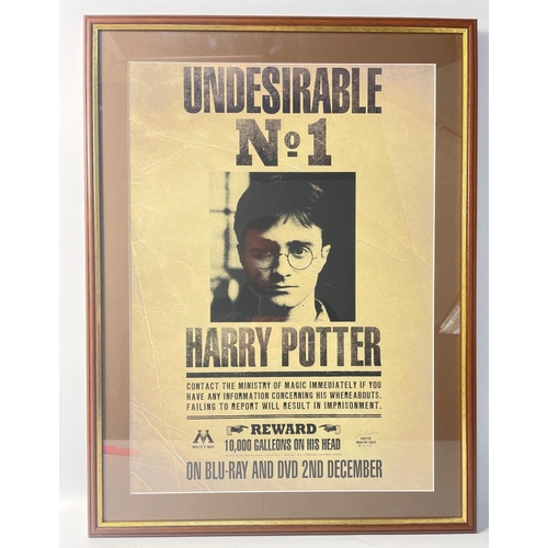 281 - HARRY POTTER -  a wooden framed WANTED poster, frame size 67x51cm approx)#280