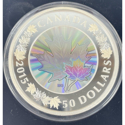 29 - Royal Canadian Mint $50 fine silver hologram coins lustrous maple leaves both encased 2013 and 2015 ... 