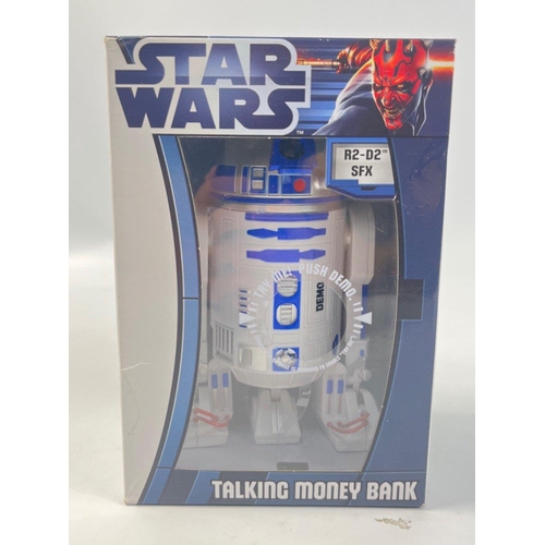 321 - STAR WARS - a R2-D2 SFX talking money bank and a Fruit of the Loom size L Star Wars t-shirt#319