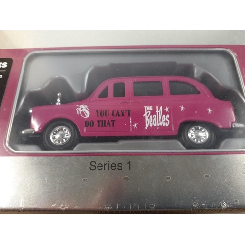 329 - THE BEATLES single sleeve die cast collectible Series 1 tin with a limited edition pink London cab w... 