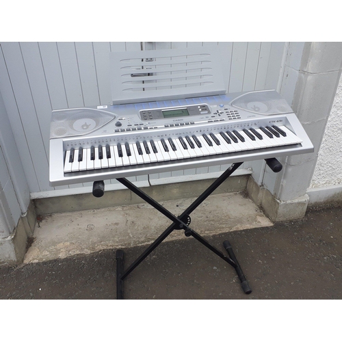 356 - A CASIO CTK-691 keyboard and stand#354