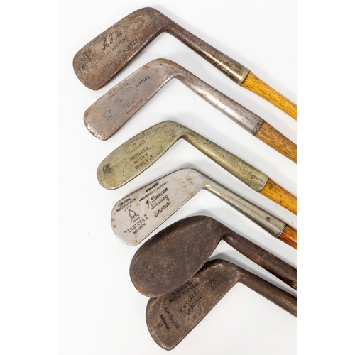 376 - A very interesting small collection an antique and vintage Scottish made golf clubs, to include:
A J... 