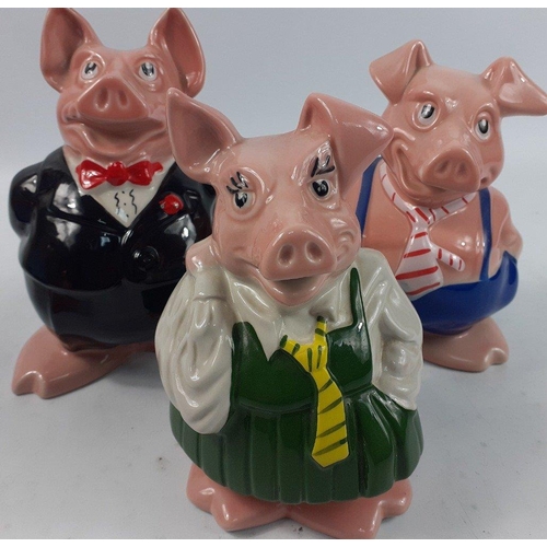 388 - A family of five WADE NatWest piggy banks in as new condition with original stoppers#386