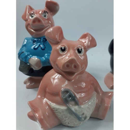 388 - A family of five WADE NatWest piggy banks in as new condition with original stoppers#386