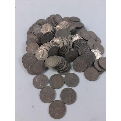 41 - A large amount of SIXPENCE coins dating from 1940s 50s and 60s 1100grams total weight#41