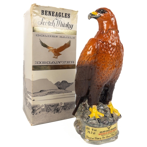 501 - A boxed BENEAGLES GOLDEN EAGLE decanter containing 26fl oz , the original cork seal remains intact. ... 