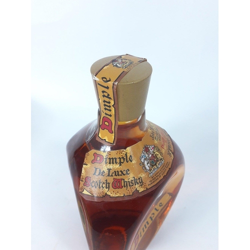 504 - A 1970s John Haig DIMPLE 26 2/3fl.ozs whisky. The item is sold as described and we do not accept lia... 