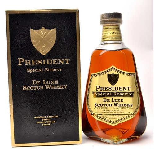 512 - THE PRESIDENT deluxe Scotch Whisky 75cl within its white liveried presentation carton - seal intact ... 