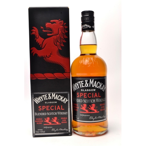 514 - WHYTE & MACKAY Glasgow 'Special' whisky 70cl within its black and red liveried presentation cart... 