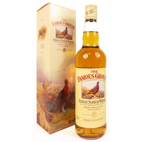 523 - A boxed bottle of the FAMOUS GROUSE blended whisky. The item is sold as described and we do not acce... 