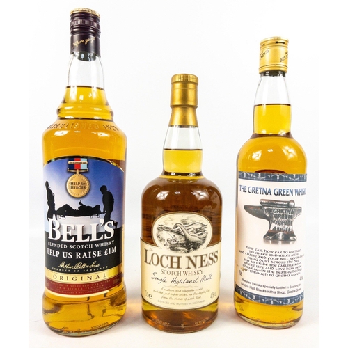 539 - A superb collection of three whisky bottles.  LOCH NESS Single Highland Malt Scotch Whisky - 70cl. G... 