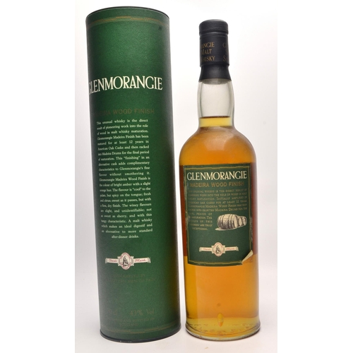 561 - PART OF THE GLENMORANGIE COLLECTION to include a bottle of Glenmorangie Madeira Finish 70cl,  - bott... 