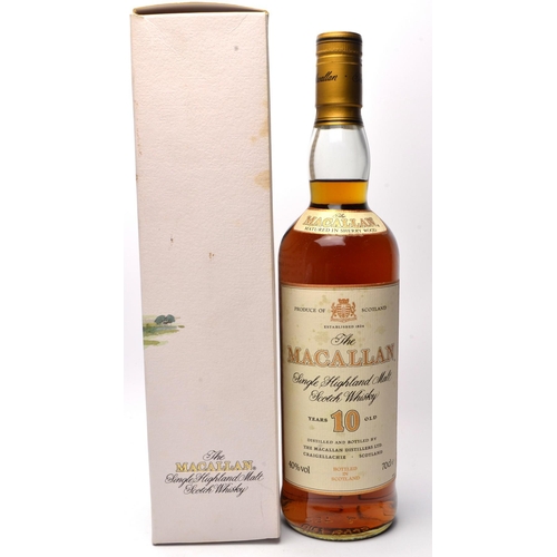 565 - THE MACALLAN 10 Year Old 70cl 40% Vol within white liveried presentation box  - seal intact - good c... 