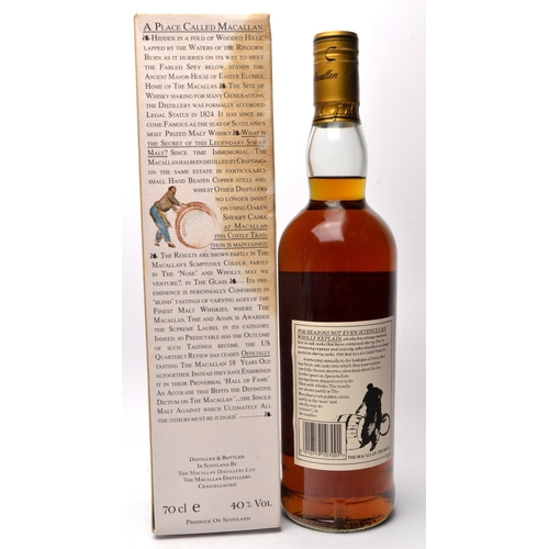 565 - THE MACALLAN 10 Year Old 70cl 40% Vol within white liveried presentation box  - seal intact - good c... 