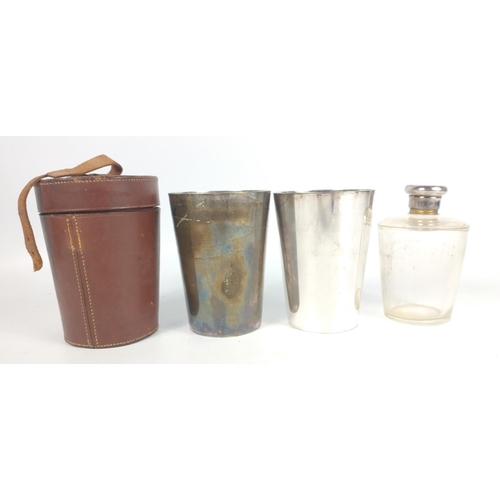 672 - Leather cased antique travelling beakers and matched screw top bottle.  TREACHER & Co. Bombay &a... 