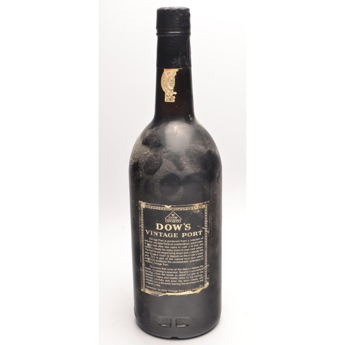 692 - A bottle of DOWS VINTAGE PORT 75cl 1983 seal intact and discovered in an old cellar cupboard complet... 