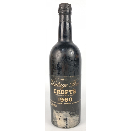 695 - A 1960 bottle of CROFT'S VINTAGE PORT. The item is sold as described and we do not accept liability ... 