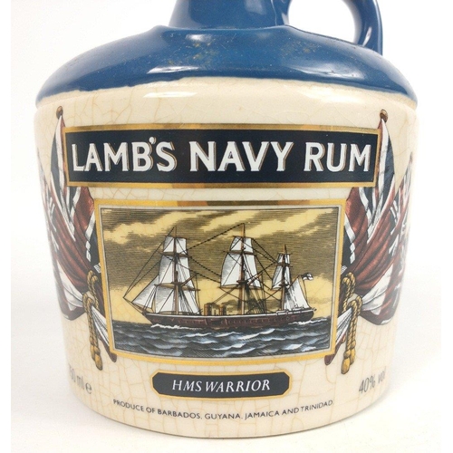 710 - A 75cl ceramic decanter of LAMB'S NAVY RUM commemorating HMS WARRIOR. The item is sold as described ... 