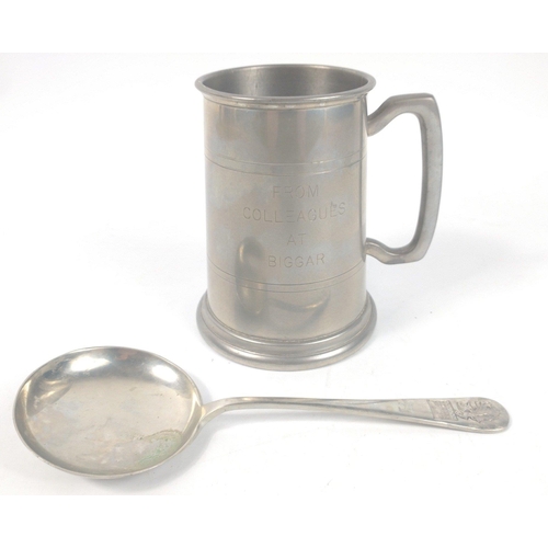 722 - An English pewter tankard by Pinder Bros engraved ''From Colleagues at Biggar'' 13cm high approx.  A... 