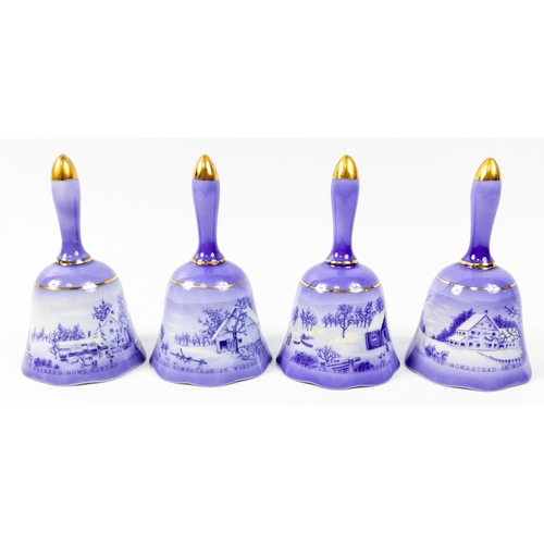 130 - 4 small blue decorative COPENHAGEN style hand bells with gilt trim the bells are 13cm tall#141