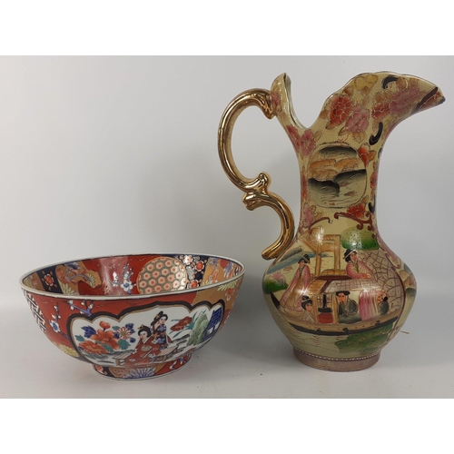 131 - Two modern eye catching ORIENTAL Ceramic items a large 34cm gilt handled jug decorated with boating ... 