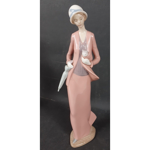 139 - Two 31cm tall NAO by LLADRO figures of 1920s style FLAPPER GIRLS one in a white dress and the other ... 