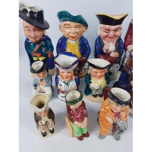 144 - A selection of 13 CHARACTER JUGS ranging in size from 7cm to 21cm tall and a BEER STEIN#155