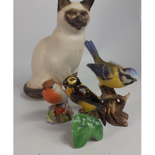 148 - A ceramic SIAMESE cat 20cm tall and 3 small ceramic birds by various makers#159