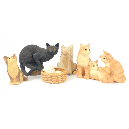 154 - A collection of 5 cat figurines including a lucky black resin cat (10cm), a soapstone sitting cat (9... 