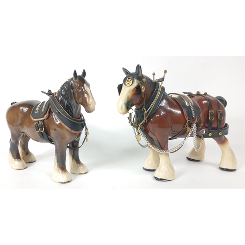 170 - Two Clydesdale horse models complete with their tack, taller horse stands at 22cm high#181