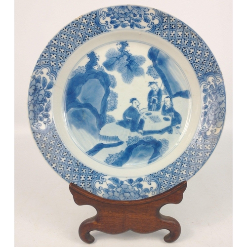 178 - A Chinese blue and white plate (21cm), with pattern of men in a garden, marks to base, a few minor c... 