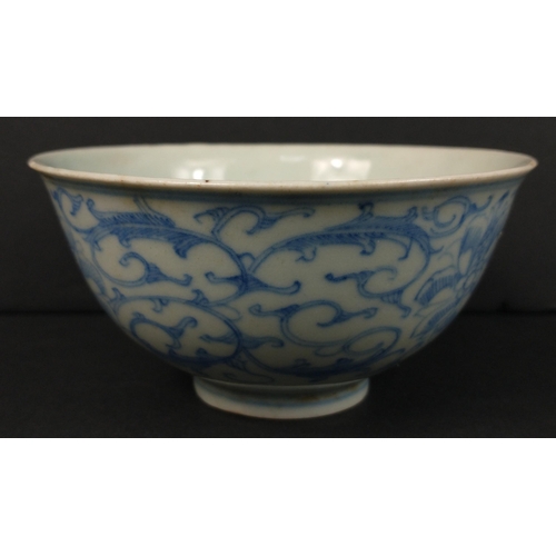 179 - A small Chinese bowl (11cm dia) with a scrolled floral design, with marking to base, a few minor cra... 