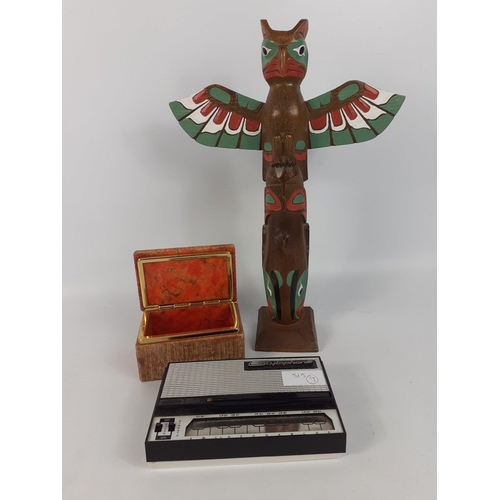 229 - A small mixed lot comprising of a 36cm tall resin CANADIAN TOTEM POLE a STYLOPHONE and a small ONYX ... 