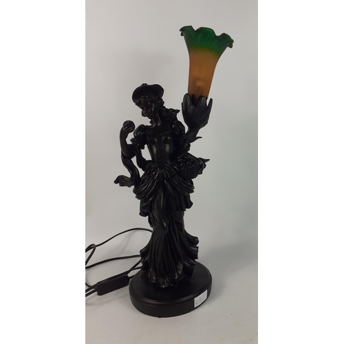 291 - An elegant lady table lamp supporting a lily-shaped glass shade height of support approx 45cm, with ... 