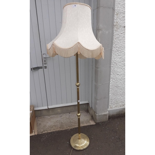 294 - Large metal floor lamp with cream brocade style fringed shade.  Stands 170cm high approx.#304