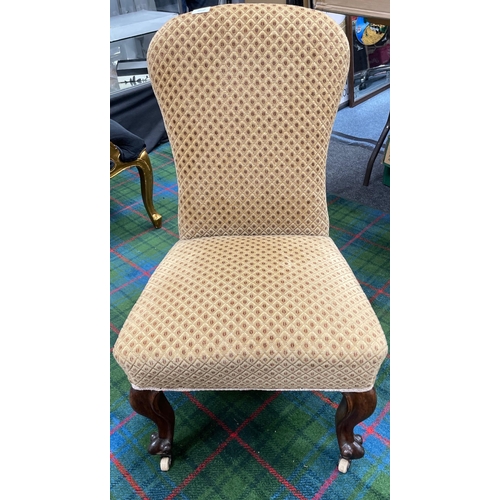 347 - A good example of an EDWARDIAN upholstered low chair with mahogany legs and  claw feet on original p... 