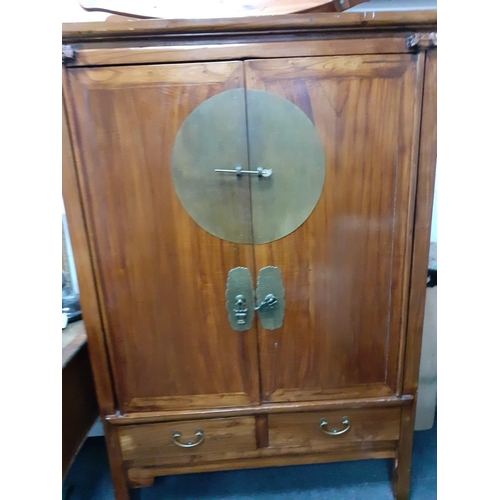 354 - QUALITY!! 
A beautiful tall CHINESE cabinet with two cupboard doors and two drawers with large brass... 