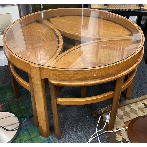 359 - 1960s  NATHAN TRINITY England round Coffee Table In bentwood oak and teak with nesting trio of teard... 