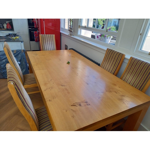 362 - A substantial  light Oak dining table by ROYAL OAK and six matching oak dining chairs in striped fab... 