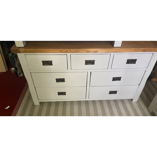 369 - Part of a bedroom set - a three over four low chest of drawers finished in light grey - height 75cm ... 