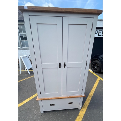 372 - Part of a bedroom set - a two piece wardrobe with one large base drawer finished in light grey - hei... 