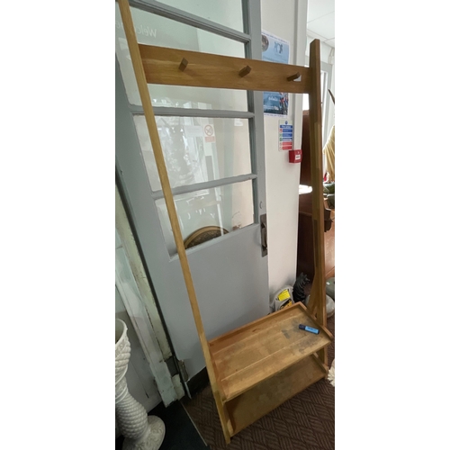 373 - A tall modern light oak coat stand with two shoe shelves - height 190cm x width 70cm x depth of shel... 