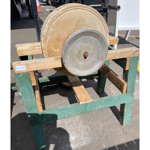 389 - A GENUINE antique sandstone knife sharpener ( probably belt driven) on a modernist joiner made frame... 