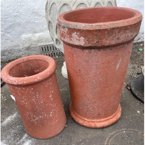 403 - One large and one small TERRACOTTA chimney pot largest dimensions 47cm height x 28cm diameter  and t... 